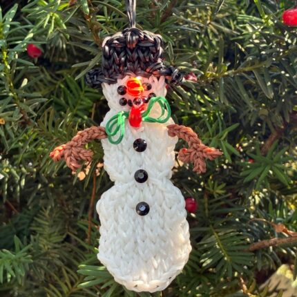 Flurry the Snowman Christmas ornament with a top hat and rhinestone features, made from white and black rubber bands.