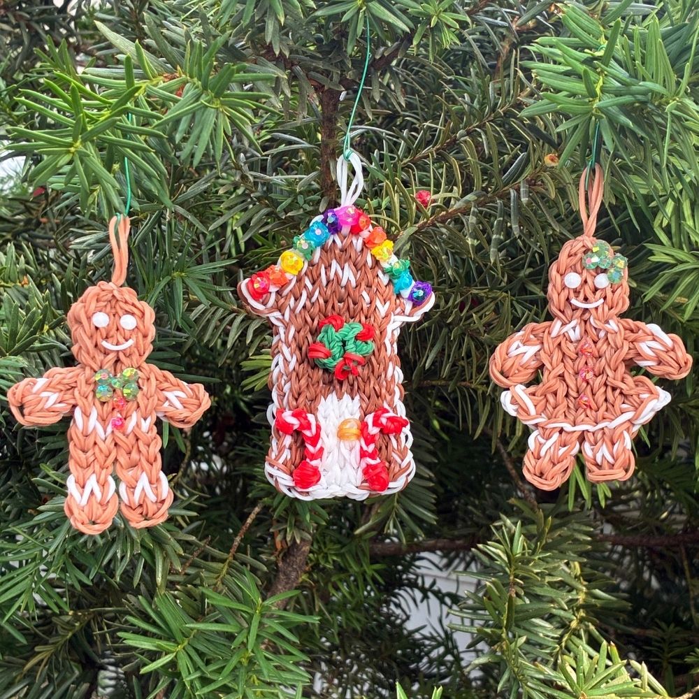 41 Complete Gingerbread Christmas ornament set featuring a house, a gingerbread boy, and a gingerbread girl, all made from rubber bands and rhinestones.